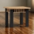 Stolik_kawowy_z_lamelami_GAMMEL_70x70_cm_dąb_craft___czarne_nogi_(3)_KOD_GSLAM023.webp