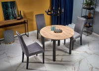 Okrągły_stół_rozkładany_HALINKA__102-142cm_w_stylu_loftowym_dąb_artisan,_nogi_czarne_(4)_KOD_HLRIN45.webp